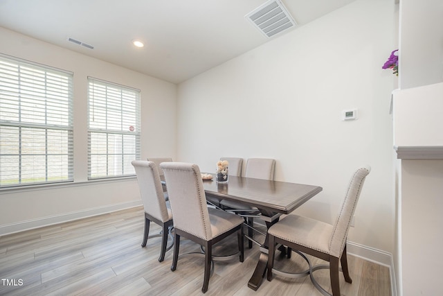 113 Blandford St, Franklinton, NC 27525 - dining space with baseboards, light wood-style floors, and recessed lighting