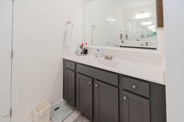 176 Lowery Ln, Benson, NC 27504 - bathroom with vanity, baseboards, and marble finish flooring