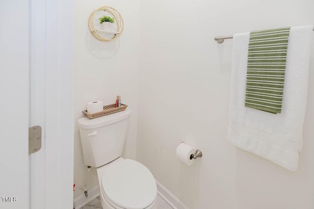 176 Lowery Ln, Benson, NC 27504 - bathroom featuring toilet and baseboards