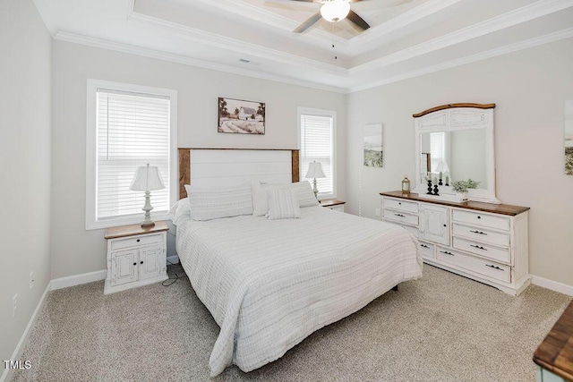 176 Lowery Ln, Benson, NC 27504 - bedroom with crown molding, a raised ceiling, light carpet, and baseboards