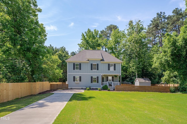 3003 University Dr, Durham, NC 27707 - view of front of home with board and batten siding, covered porch, and driveway