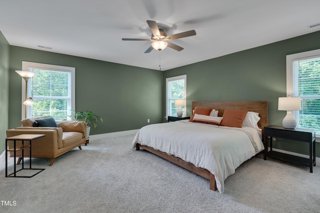 3003 University Dr, Durham, NC 27707 - bedroom featuring baseboards, carpet, and ceiling fan