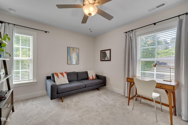 3003 University Dr, Durham, NC 27707 - living area featuring plenty of natural light and light colored carpet