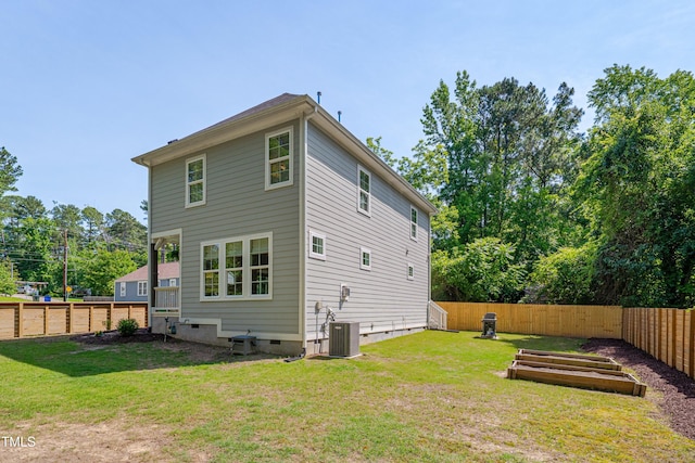 3003 University Dr, Durham, NC 27707 - rear view of property with central AC unit and crawl space