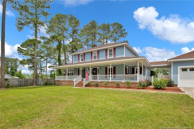 country-style home featuring covered porch and a garage