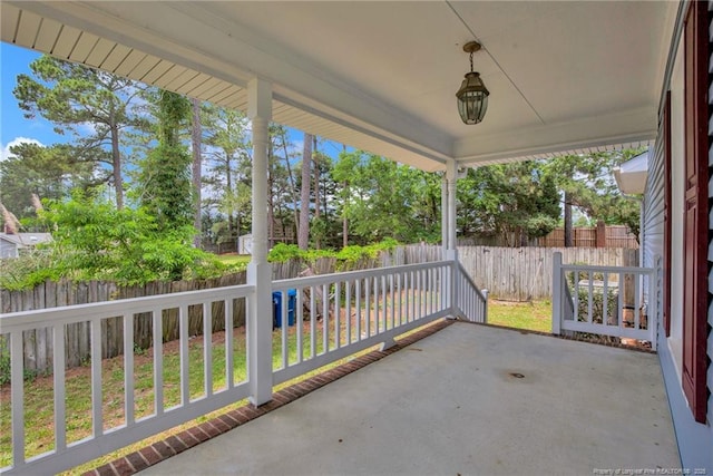 fenced backyard featuring a patio area