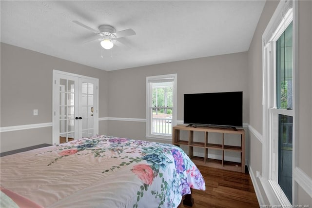 bedroom with french doors, wood finished floors, ceiling fan, and a textured ceiling