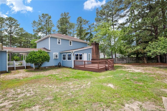 back of house featuring a wooden deck, a chimney, and crawl space