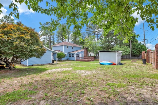 view of yard featuring a wooden deck