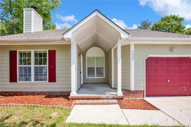 doorway to property with an attached garage, a chimney, a shingled roof, and a porch