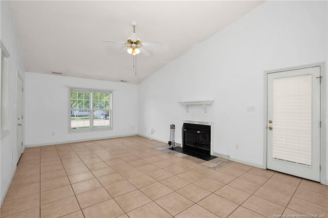 unfurnished living room featuring ceiling fan, light tile patterned floors, a fireplace with flush hearth, high vaulted ceiling, and baseboards
