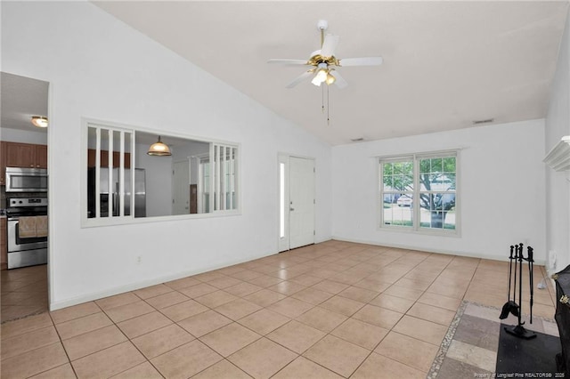 unfurnished living room featuring light tile patterned floors, a ceiling fan, and high vaulted ceiling