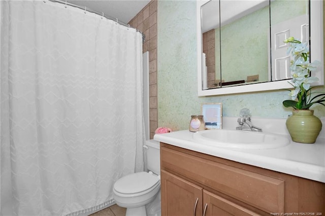 bathroom with vanity, toilet, a shower with curtain, and tile patterned floors