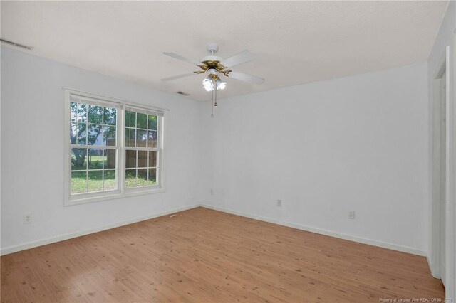 3632 Lubbock Dr, Hope Mills, NC 28348 - unfurnished room featuring light wood finished floors, baseboards, and a ceiling fan