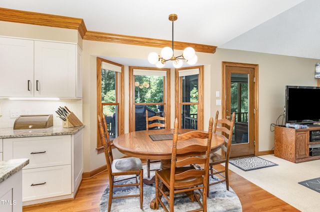 108 Hanover Pl, Chapel Hill, NC 27516 - dining room featuring a chandelier, plenty of natural light, and baseboards