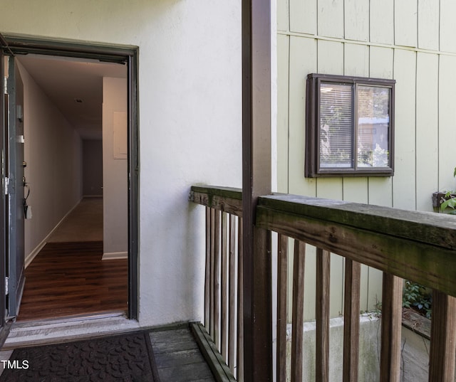 entrance to property with stucco siding
