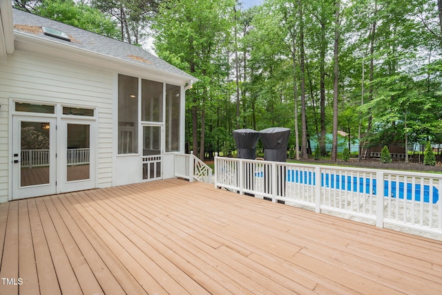 12301 Hardee Rd, Raleigh, NC 27614 - deck featuring a sunroom and view of scattered trees