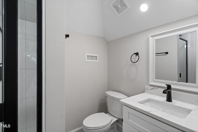 12301 Hardee Rd, Raleigh, NC 27614 - full bath featuring vanity, toilet, vaulted ceiling, and a tile shower