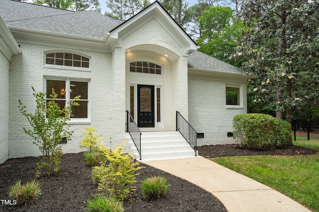 12301 Hardee Rd, Raleigh, NC 27614 - view of exterior entry featuring roof with shingles and brick siding