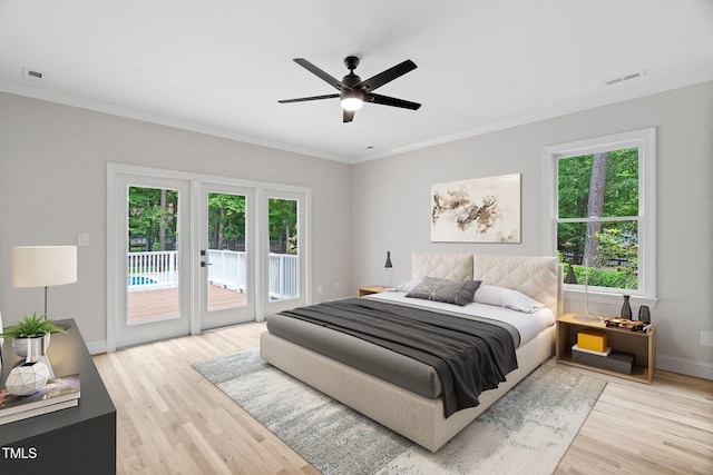 12301 Hardee Rd, Raleigh, NC 27614 - bedroom with access to exterior, crown molding, light wood-style floors, baseboards, and a ceiling fan
