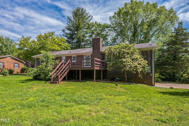 4407 Bromley Dr, Greensboro, NC 27406 - rear view of house with stairway, a deck, a lawn, a chimney, and brick siding