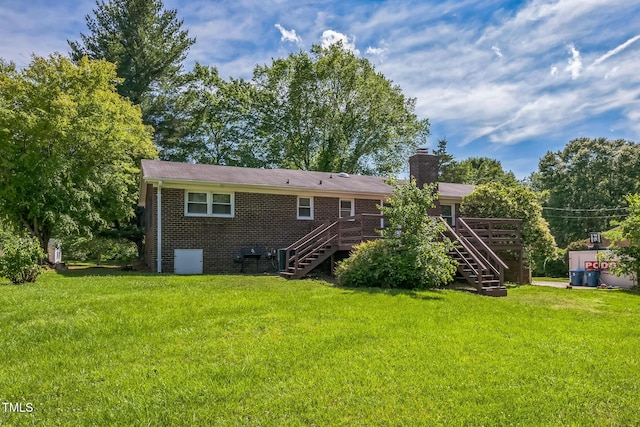4407 Bromley Dr, Greensboro, NC 27406 - rear view of house with stairway, a deck, brick siding, and a yard