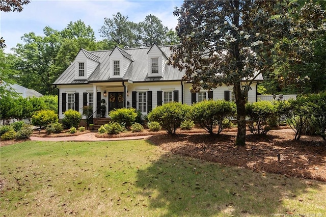2190 Keith Hills Rd, Lillington, NC 27546 - cape cod house with a front yard and metal roof
