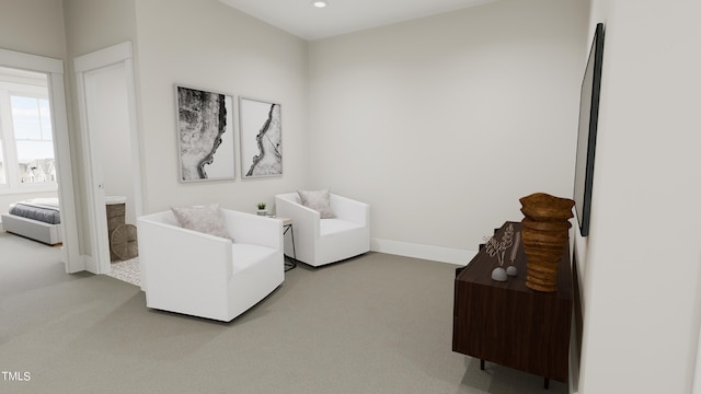 4091 Elk Creek Ln Unit 9, Raleigh, NC 27612 - carpeted living area featuring baseboards and recessed lighting
