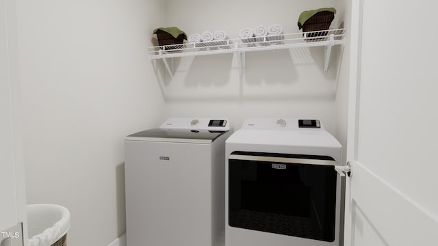 4091 Elk Creek Ln Unit 9, Raleigh, NC 27612 - laundry room with washing machine and dryer