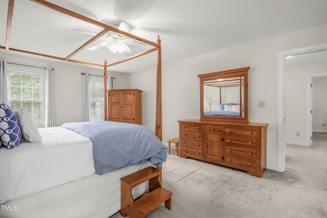 1113 Smokewood Dr, Apex, NC 27502 - bedroom with carpet, a ceiling fan, and baseboards