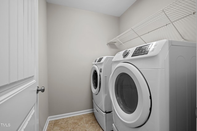 850 Apalachia Lake Dr, Fuquay Varina, NC 27526 - laundry room featuring washer and clothes dryer and baseboards