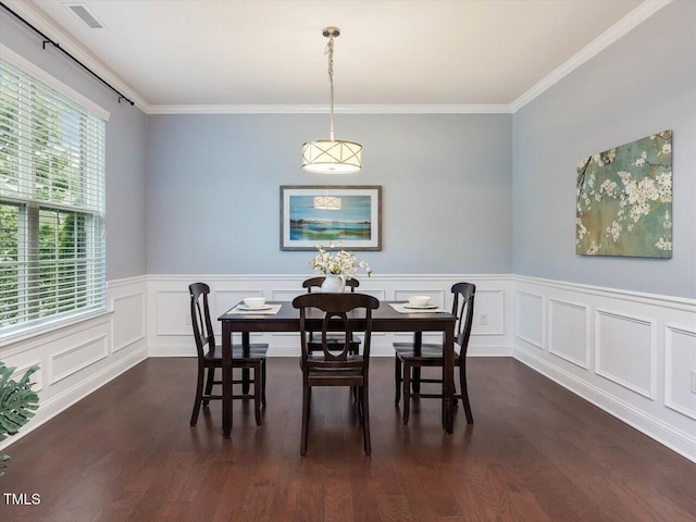 136 Shadow Hawk Dr, Durham, NC 27713 - dining room with ornamental molding, dark wood-type flooring, a wainscoted wall, and a decorative wall