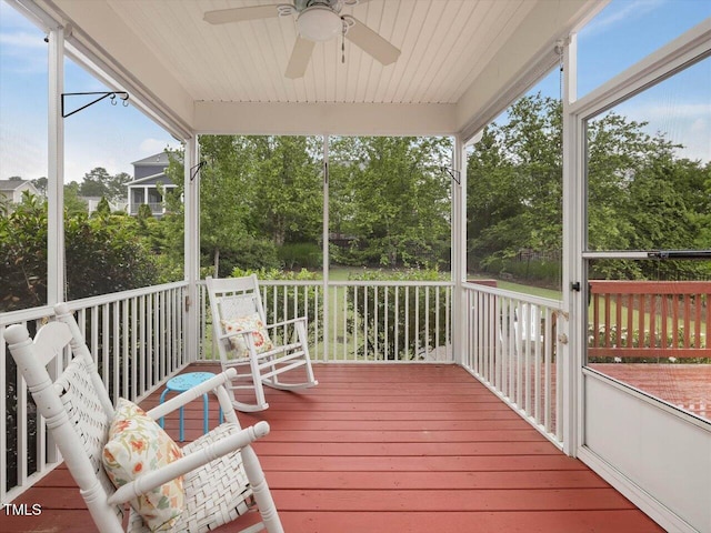 136 Shadow Hawk Dr, Durham, NC 27713 - wooden deck with a ceiling fan and view of scattered trees