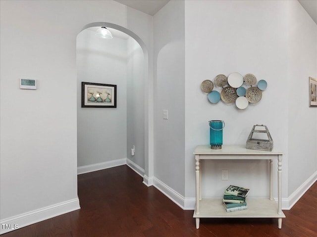 136 Shadow Hawk Dr, Durham, NC 27713 - hall featuring arched walkways, wood finished floors, and baseboards