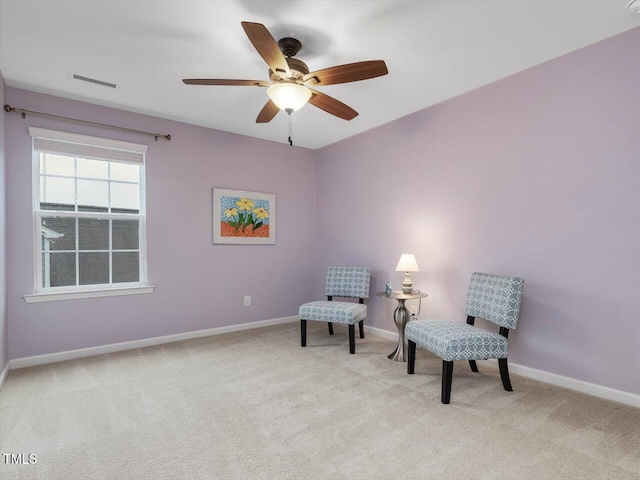 136 Shadow Hawk Dr, Durham, NC 27713 - living area with light carpet, baseboards, and ceiling fan