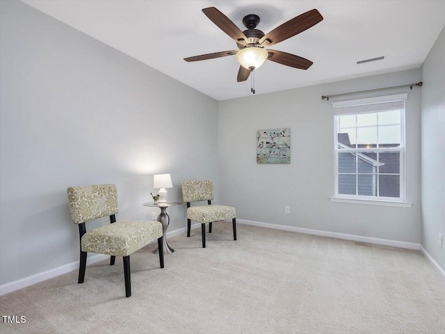 136 Shadow Hawk Dr, Durham, NC 27713 - sitting room with light carpet, a ceiling fan, and baseboards