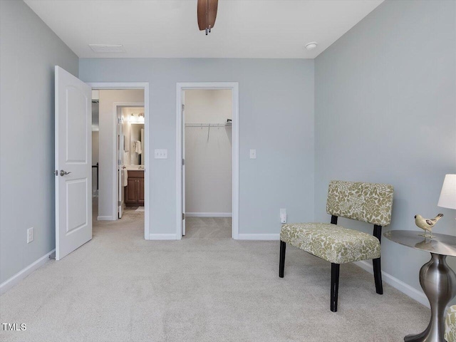 136 Shadow Hawk Dr, Durham, NC 27713 - living area featuring light carpet, baseboards, and a ceiling fan
