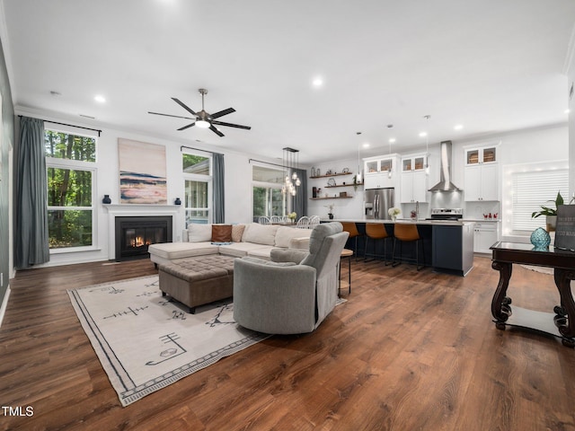 3400 Appling Way, Durham, NC 27703 - living room with a fireplace with flush hearth, a ceiling fan, dark wood-style flooring, and recessed lighting