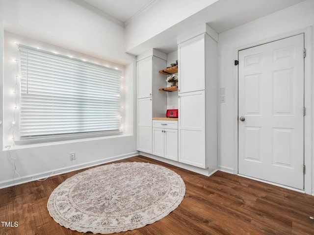 3400 Appling Way, Durham, NC 27703 - sitting room with ornamental molding and dark wood-type flooring