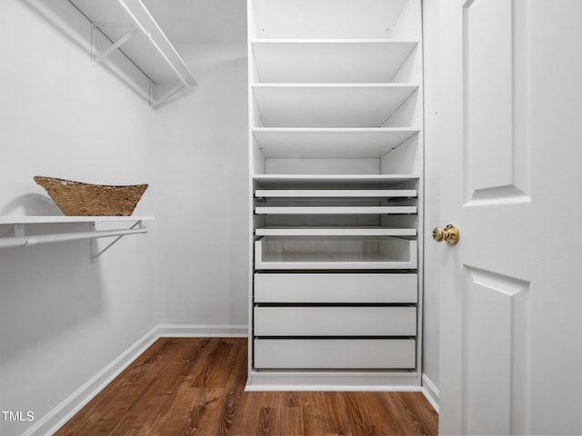 3400 Appling Way, Durham, NC 27703 - walk in closet featuring dark wood-type flooring