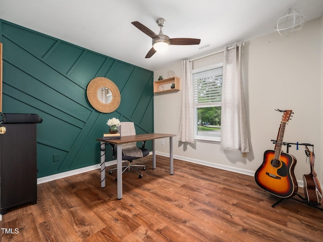 3400 Appling Way, Durham, NC 27703 - office featuring ceiling fan, wood finished floors, and a decorative wall