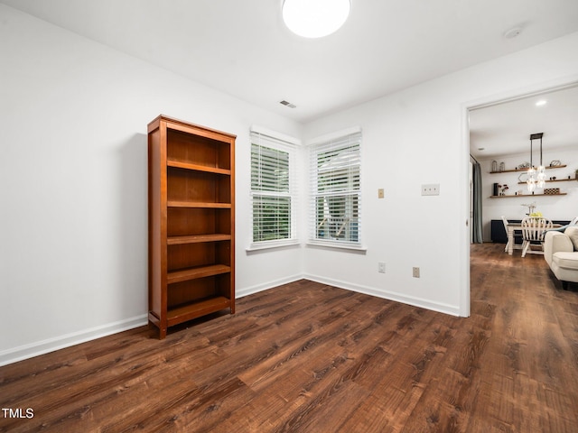 3400 Appling Way, Durham, NC 27703 - spare room featuring dark wood-style floors and baseboards