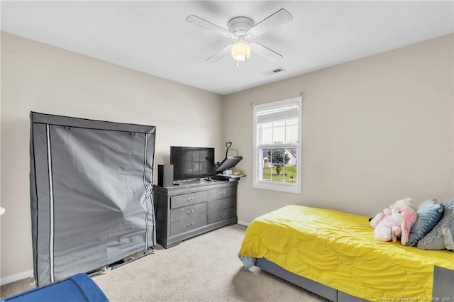 5028 Windflower Dr, Fayetteville, NC 28314 - carpeted bedroom with baseboards and a ceiling fan