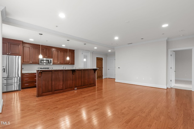 710 Independence Pl Unit 301, Raleigh, NC 27603 - kitchen featuring appliances with stainless steel finishes, recessed lighting, a breakfast bar area, baseboards, and light wood-style flooring