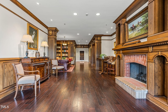 710 Independence Pl Unit 301, Raleigh, NC 27603 - living area featuring crown molding, wood-type flooring, a fireplace, and recessed lighting