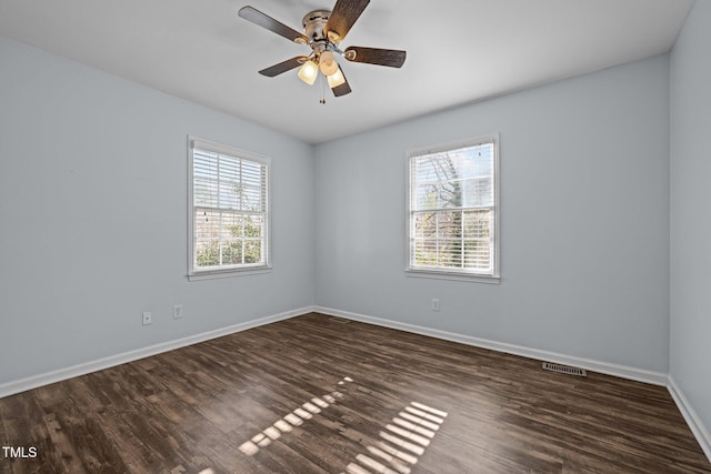 1195 Champion Dr, Cary, NC 27511 - spare room featuring baseboards, wood finished floors, and ceiling fan
