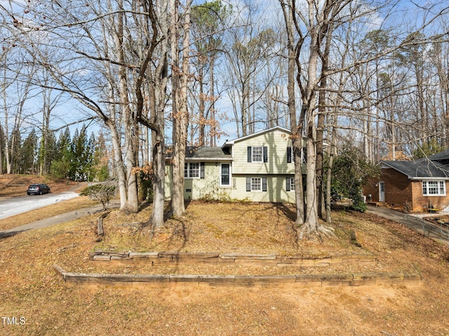 1195 Champion Dr, Cary, NC 27511 - split level home featuring driveway