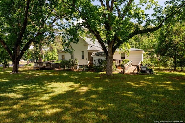 5648 Tolarsville Rd, Saint Pauls, NC 28384 - view of green lawn featuring a wooden deck
