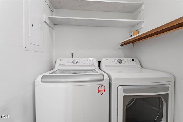 4705 Walden Pond Dr Unit 110-C, Raleigh, NC 27604 - laundry room featuring washing machine and clothes dryer
