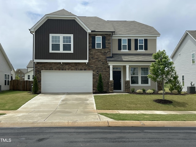 30 Junius Birch Trl, Franklinton, NC 27525 - craftsman house featuring an attached garage, stone siding, concrete driveway, roof with shingles, and board and batten siding